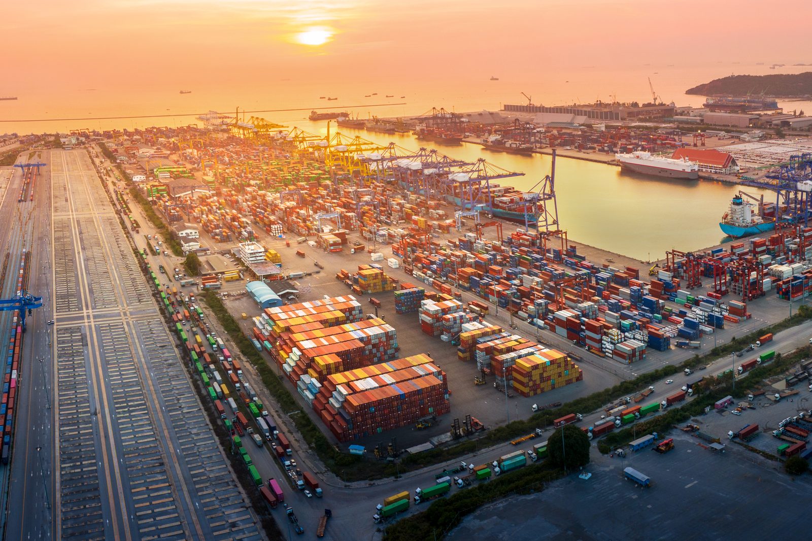 Container port terminal at sunset